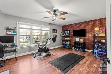 Discover this beautifully updated 4-bedroom 2.5-bath (plus huge on Northstone Country Club in North Carolina - for sale on GolfHomes.com, golf home, golf lot