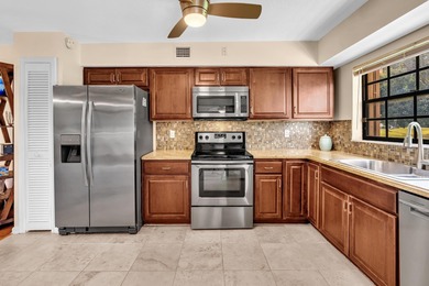 JUST REDUCED $10,000! Experience Country Club living without the on The Boca Country Club in Florida - for sale on GolfHomes.com, golf home, golf lot