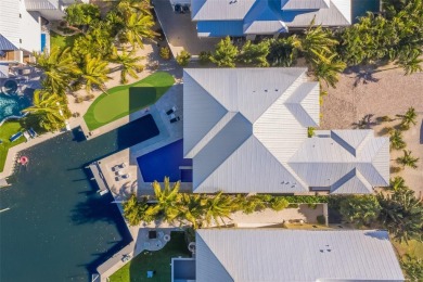 Welcome to your dream coastal retreat on beautiful Anna Maria on Key Royale Club in Florida - for sale on GolfHomes.com, golf home, golf lot