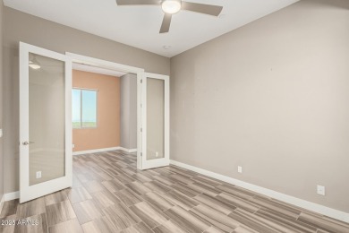 Picturesque Pinnacle Peak mountain, sunset and city light views on Troon Country Club in Arizona - for sale on GolfHomes.com, golf home, golf lot