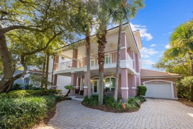 Discover coastal living at its finest in this elegant on Regatta Bay Golf and Country Club in Florida - for sale on GolfHomes.com, golf home, golf lot