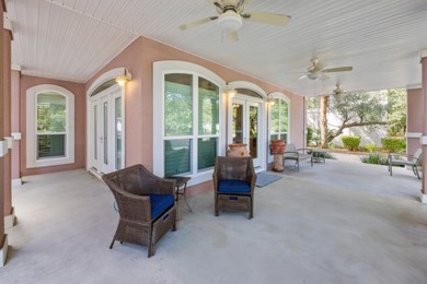 Discover coastal living at its finest in this elegant on Regatta Bay Golf and Country Club in Florida - for sale on GolfHomes.com, golf home, golf lot