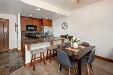 This exquisite top-floor residence in Highland Greens Lodge on Breckenridge Golf Club in Colorado - for sale on GolfHomes.com, golf home, golf lot