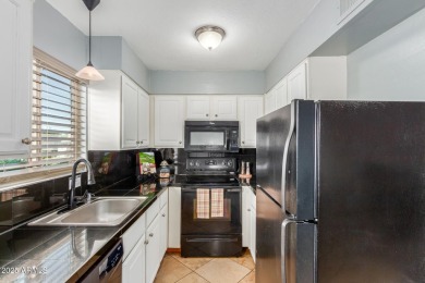 Welcome to this charming 2-bedroom 1.5 bath townhome! Inside on The Phoenician  in Arizona - for sale on GolfHomes.com, golf home, golf lot