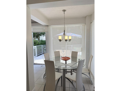 Fabulous 4 bed 3 bath home in prestigious Tiffany Trace located on The Boca Country Club in Florida - for sale on GolfHomes.com, golf home, golf lot