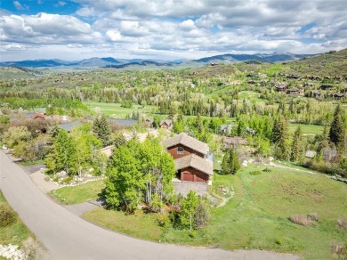 This exceptional 4-bedroom mountain home is perfectly perched on on Rollingstone Ranch Golf Club in Colorado - for sale on GolfHomes.com, golf home, golf lot