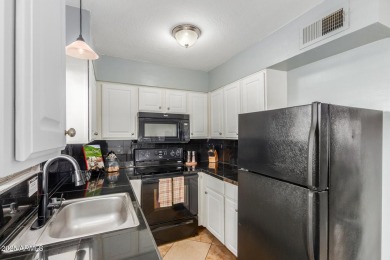 Welcome to this charming 2-bedroom 1.5 bath townhome! Inside on The Phoenician  in Arizona - for sale on GolfHomes.com, golf home, golf lot