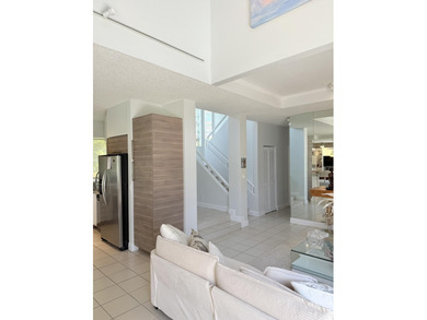 Fabulous 4 bed 3 bath home in prestigious Tiffany Trace located on The Boca Country Club in Florida - for sale on GolfHomes.com, golf home, golf lot