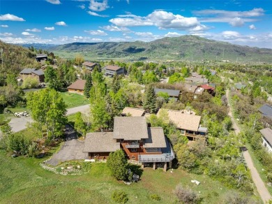 This exceptional 4-bedroom mountain home is perfectly perched on on Rollingstone Ranch Golf Club in Colorado - for sale on GolfHomes.com, golf home, golf lot