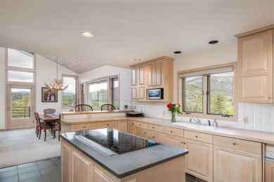 This exceptional 4-bedroom mountain home is perfectly perched on on Rollingstone Ranch Golf Club in Colorado - for sale on GolfHomes.com, golf home, golf lot