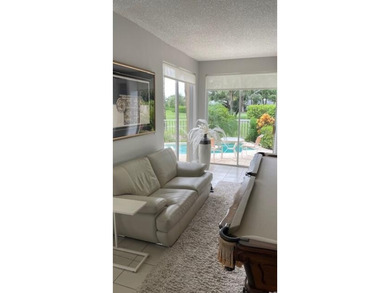 Fabulous 3 bed 3 bath home in prestigious Tiffany Trace located on The Boca Country Club in Florida - for sale on GolfHomes.com, golf home, golf lot