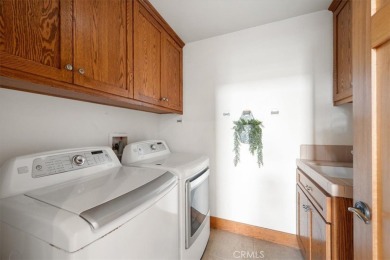 Located in the prestigious gated community of Cypress Ridge on Cypress Ridge in California - for sale on GolfHomes.com, golf home, golf lot