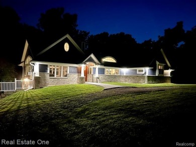 Presenting a beautifully remodeled Craftsman-style home that on Orchard Lake Country Club in Michigan - for sale on GolfHomes.com, golf home, golf lot