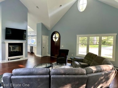 Presenting a beautifully remodeled Craftsman-style home that on Orchard Lake Country Club in Michigan - for sale on GolfHomes.com, golf home, golf lot