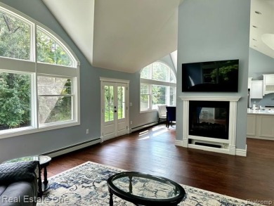 Presenting a beautifully remodeled Craftsman-style home that on Orchard Lake Country Club in Michigan - for sale on GolfHomes.com, golf home, golf lot