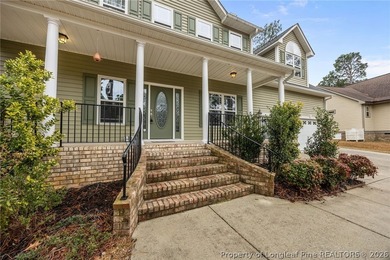 Enjoy outdoor living at its finest with a screened porch on Carolina Lakes Country Club in North Carolina - for sale on GolfHomes.com, golf home, golf lot