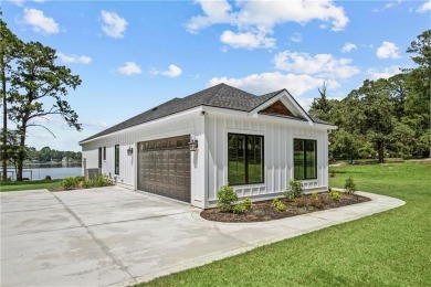 STUNNING MODERN LAKEFRONT HOME ON LAKE SINCLAIR! This sleek and on Milledgeville Country Club in Georgia - for sale on GolfHomes.com, golf home, golf lot