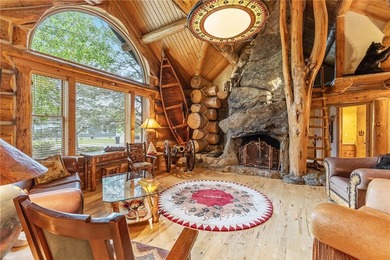 An extraordinary log home surrounded by mature trees and on Red Lodge Golf Club in Montana - for sale on GolfHomes.com, golf home, golf lot