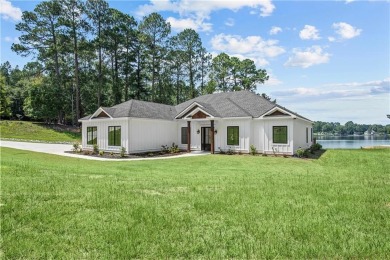 STUNNING MODERN LAKEFRONT HOME ON LAKE SINCLAIR! This sleek and on Milledgeville Country Club in Georgia - for sale on GolfHomes.com, golf home, golf lot