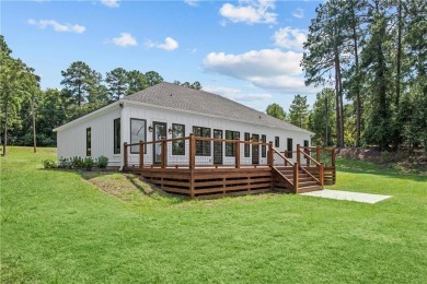 STUNNING MODERN LAKEFRONT HOME ON LAKE SINCLAIR! This sleek and on Milledgeville Country Club in Georgia - for sale on GolfHomes.com, golf home, golf lot