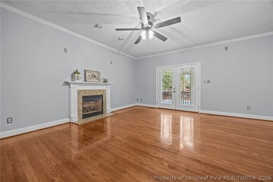 Enjoy outdoor living at its finest with a screened porch on Carolina Lakes Country Club in North Carolina - for sale on GolfHomes.com, golf home, golf lot