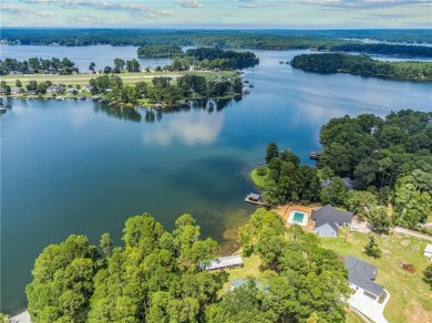 STUNNING MODERN LAKEFRONT HOME ON LAKE SINCLAIR! This sleek and on Milledgeville Country Club in Georgia - for sale on GolfHomes.com, golf home, golf lot