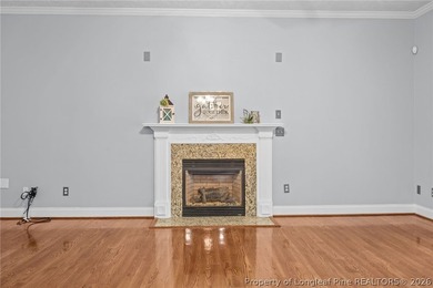 Enjoy outdoor living at its finest with a screened porch on Carolina Lakes Country Club in North Carolina - for sale on GolfHomes.com, golf home, golf lot