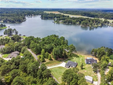 STUNNING MODERN LAKEFRONT HOME ON LAKE SINCLAIR! This sleek and on Milledgeville Country Club in Georgia - for sale on GolfHomes.com, golf home, golf lot