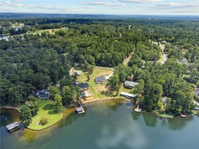 STUNNING MODERN LAKEFRONT HOME ON LAKE SINCLAIR! This sleek and on Milledgeville Country Club in Georgia - for sale on GolfHomes.com, golf home, golf lot