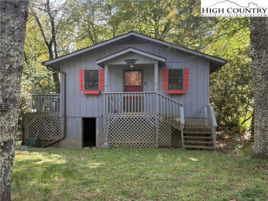 Two bedroom, one bath home on the Linville River. Trout fish out on Land Harbor Golf Course in North Carolina - for sale on GolfHomes.com, golf home, golf lot