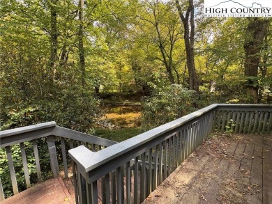 Two bedroom, one bath home on the Linville River. Trout fish out on Land Harbor Golf Course in North Carolina - for sale on GolfHomes.com, golf home, golf lot