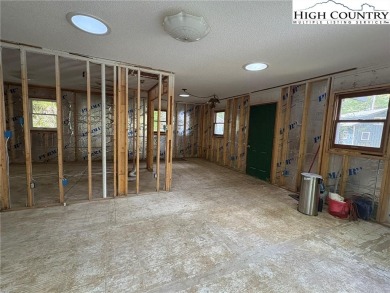 Two bedroom, one bath home on the Linville River. Trout fish out on Land Harbor Golf Course in North Carolina - for sale on GolfHomes.com, golf home, golf lot