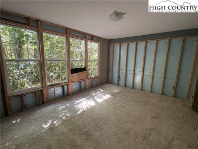 Two bedroom, one bath home on the Linville River. Trout fish out on Land Harbor Golf Course in North Carolina - for sale on GolfHomes.com, golf home, golf lot