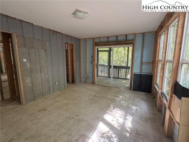Two bedroom, one bath home on the Linville River. Trout fish out on Land Harbor Golf Course in North Carolina - for sale on GolfHomes.com, golf home, golf lot