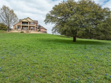 Scenic sunsets and lake views from both patio levels of this on White Bluff Resort - Old Course in Texas - for sale on GolfHomes.com, golf home, golf lot