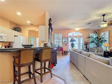 Discover this rare Egret model home-a distinctive variation of on Herons Glen Golf and Country Club in Florida - for sale on GolfHomes.com, golf home, golf lot