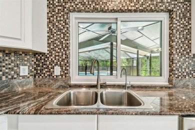 Welcome to 5702 Ainsworth Ct W - A Tampa Palms Treasure!
Tucked on Tampa Palms Golf and Country Club in Florida - for sale on GolfHomes.com, golf home, golf lot