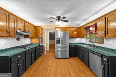 Welcome to this beautifully maintained, 4 bed, 2.5 bath, home on West Pines Golf Club in Georgia - for sale on GolfHomes.com, golf home, golf lot