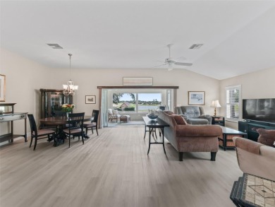 This Custom expanded Gardenia Model has pictuesqes views through on Truman Executive Golf Course in Florida - for sale on GolfHomes.com, golf home, golf lot