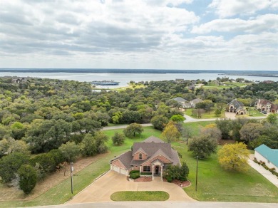 Scenic sunsets and lake views from both patio levels of this on White Bluff Resort - Old Course in Texas - for sale on GolfHomes.com, golf home, golf lot