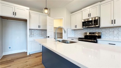 This bright and comfortable three-bedroom, two-bathroom ranch on Golf Club of Creekmoor in Missouri - for sale on GolfHomes.com, golf home, golf lot