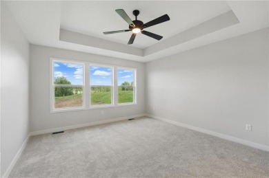 This bright and comfortable three-bedroom, two-bathroom ranch on Golf Club of Creekmoor in Missouri - for sale on GolfHomes.com, golf home, golf lot