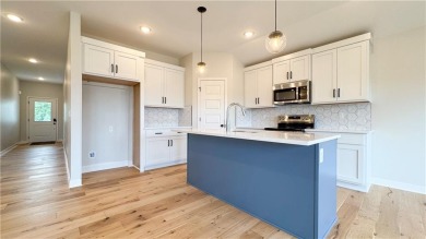 This bright and comfortable three-bedroom, two-bathroom ranch on Golf Club of Creekmoor in Missouri - for sale on GolfHomes.com, golf home, golf lot