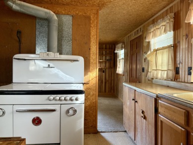 Tucked away in the heart of Rockwood, this charming 480 sq. ft on Mt. Kineo Golf Course in Maine - for sale on GolfHomes.com, golf home, golf lot