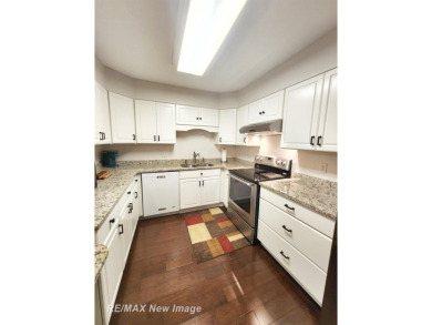** Best offer Due By 5/31 at 7 pm * Stunning executive condo on on Swan Valley Golf Club in Michigan - for sale on GolfHomes.com, golf home, golf lot