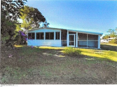 Remodeled with a new roof, new garage for golf cart, and a on Lake Fairways Country Club in Florida - for sale on GolfHomes.com, golf home, golf lot