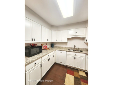 ** Best offer Due By 5/31 at 7 pm * Stunning executive condo on on Swan Valley Golf Club in Michigan - for sale on GolfHomes.com, golf home, golf lot