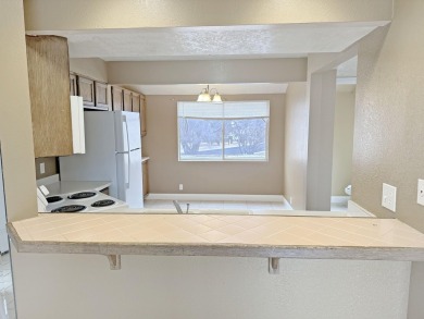 This beautiful condo offers vaulted ceilings, large kitchen and on St. George Golf Course in Utah - for sale on GolfHomes.com, golf home, golf lot