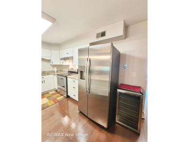 ** Best offer Due By 5/31 at 7 pm * Stunning executive condo on on Swan Valley Golf Club in Michigan - for sale on GolfHomes.com, golf home, golf lot