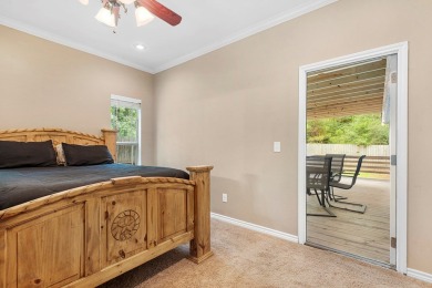Nestled within the serene landscapes of Rayburn Country Resort on Rayburn Country Club in Texas - for sale on GolfHomes.com, golf home, golf lot